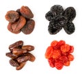 Set a heap of dried dogwood, prunes, dark dried apricots and dates on white background.