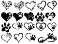 Set of hearts with the paws of dogs and cats. Collection of black and white logos with footprints of pets. Vector Royalty Free Stock Photo
