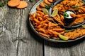 Set of homemade baked sweet potato fries with lime. Sweet potato fries with herbs on wooden background banner, menu, recipe place Royalty Free Stock Photo