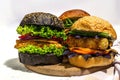 Set of homemade fish burgers. Fresh ingredients, ripe vegetables, fast food concept Royalty Free Stock Photo