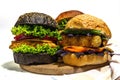 Set of homemade fish burgers. Fresh ingredients, ripe vegetables, fast food concept Royalty Free Stock Photo