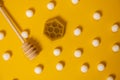 Set for honey with a piece of honey on a yellow background Royalty Free Stock Photo