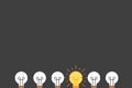 Set of horizontally kept light bulbs with one glowing and lit up . Trendy flat vector light bulb icons with concept of idea