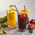 Set of hot autumn cocktails with red and white spicy mulled wines. Apple cinnamon spiced fall mulled wine and warm tropical gluhwe