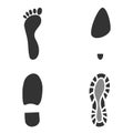 Set of humans footprint. Footprints silhouettes foot and shoes isolated on white background, Royalty Free Stock Photo