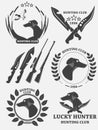 Set of hunting retriever logos, labels and badges. Dog, duck, weapons. Royalty Free Stock Photo