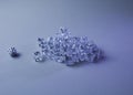 Set of ice cubes and dice falling on them Royalty Free Stock Photo