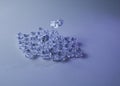 Set of ice cubes and dice falling on them Royalty Free Stock Photo