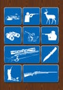 Set icons of ducks, hunter, deer, binoculars, telescopic sight, rifle. Icons in blue color on wooden background