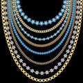 Set of gold chains, beads of precious stones in a large necklace