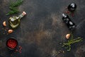 Set of Indian fragrant spices and herbs on a black stone background. Turmeric, dill, paprika, cinnamon, saffron, basil and