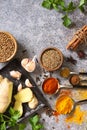 Set of Indian spices and herbs selection on a stone table. Top view flat lay background. Royalty Free Stock Photo