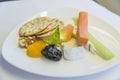 Set inflight meal appetizer on a tray, on a white table