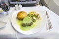 Set inflight meal steak on a tray, on a white table Royalty Free Stock Photo