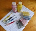 Set of Ink cartridges, refill paints and dirty syringes Royalty Free Stock Photo