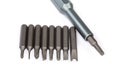 Set of different interchangeable bits for mini screwdriver, close-up Royalty Free Stock Photo