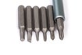 Set of different interchangeable bits for mini screwdriver, close-up