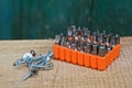 A set of iron bits for a screwdriver in an orange box Royalty Free Stock Photo