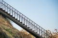 A set of iron stairs with a metal rail Royalty Free Stock Photo