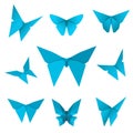 Set of isolated flying paper butterflies. Blue butterfly on the white background. Japanese origami, craft and paper style. Royalty Free Stock Photo