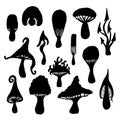 Set of isolated hand-drawn mystical mushrooms. Halloween black fungus silhouettes.