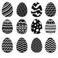 Set with isolated Monochrome silhouettes Easter eggs with different ornament in folk style on a white background. Spring