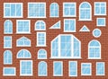 Set of isolated plastic windows on red brick wall background