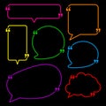 Set of isolated speech bubbles of different shapes with quotes on black background Royalty Free Stock Photo
