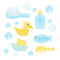 Set of items for baby bathing. Soft comb, shampoo, a thermometer for water, a rubber duck, a boat and soap bubbles.