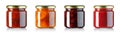 set of jam in small glass jars with metallic lids isolated on white Royalty Free Stock Photo