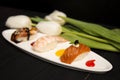 Set of Japanese Nigiri Sake Sushi with salmon in focus near nigiri Ebi with shrimp and Unagi with eel. Royalty Free Stock Photo