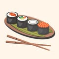 Set of Japanese nigiri sushi maki with chopsticks, leaves. Asian dish. Traditional food closeup with chopsticks, wooden tray.