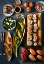 Set of Japanese sushi background hosomaki, uramaki, chinese dumpling gyoza jiaozi, maki, nigiri, with salmon, tuna, shrimp, Royalty Free Stock Photo