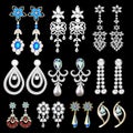 set of jewelry earrings with precious stones