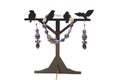 A set of jewelry from natural semi-precious stones - amethyst and garnet on a stand. Royalty Free Stock Photo