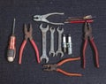 a set of key rings and wrenches for vehicle engine repair