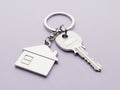 A set of keys and a house-shaped keychain on a keyring Royalty Free Stock Photo