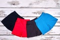 Set of kids colored cotton shorts.