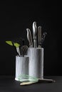 Set of kitchen knifes in a grey plactic holder