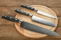 Set of kitchen knives and cutting board Royalty Free Stock Photo