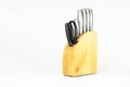 Set of kitchen knives with scissors on a white background. Royalty Free Stock Photo