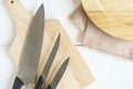 Set of kitchen knives on wooden cutting board Royalty Free Stock Photo