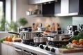 Set of kitchen metallic pans. Mockup, kitchen utensils, recipe book, cooking classes concept.