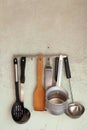 Set of kitchen tools weighs on wall