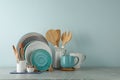 Set of kitchenware on grey marble table near light wall. Modern interior design Royalty Free Stock Photo