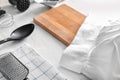 Set of kitchenware on white wooden table Royalty Free Stock Photo