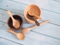 Set of kitchenware wooden with spoon, wooden cup bowl and dripper honey stick on wooden Royalty Free Stock Photo