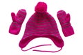 Set of pink winter hat and mittens for children isolated on white background