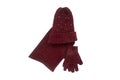 set of knitted winter gloves, hat and scarf isolated on white background Royalty Free Stock Photo