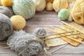 Set of knitting yarn with needles on table Royalty Free Stock Photo